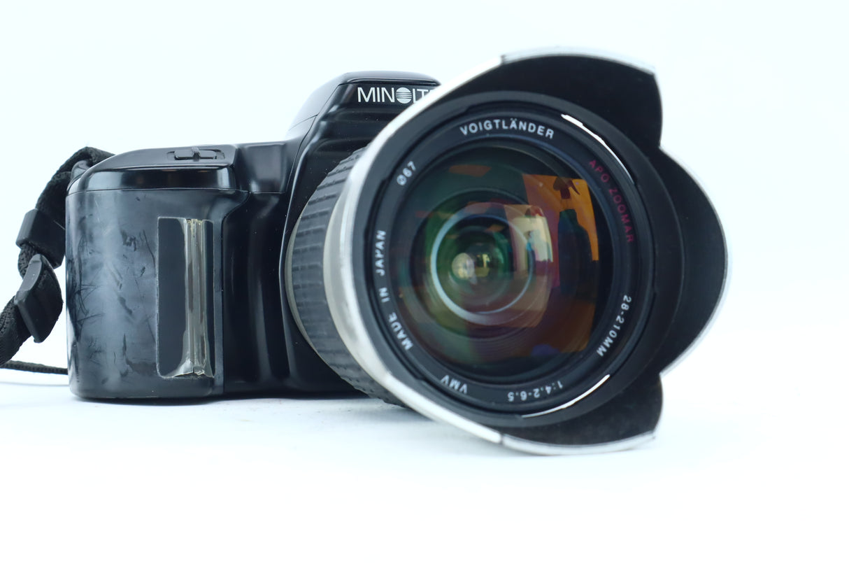 Minolta Dynax with Voigtländer 28–210mm f/4.2–6.5 Lens