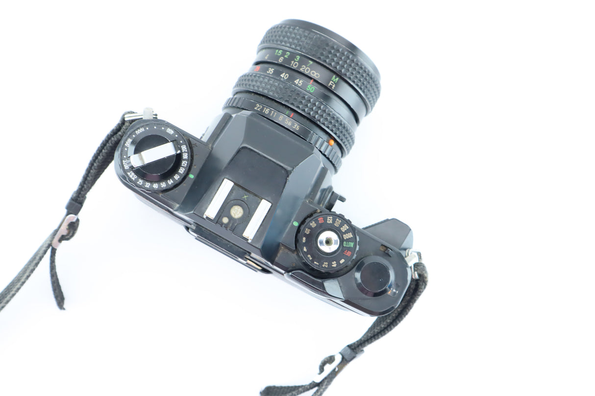 Chinon CE-4 + MC Cosinon-Z 28–50mm f/3.5–4.5