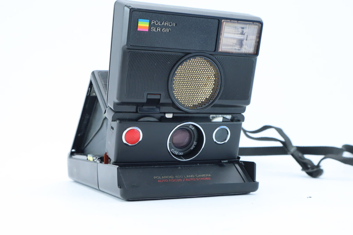 Polaroid SLR 680 – Folding Instant Camera with Sonar Autofocus.