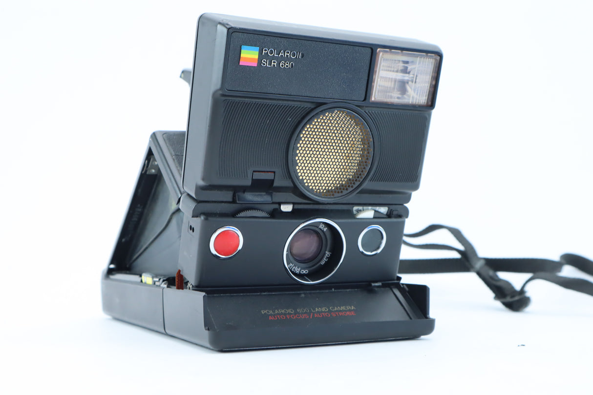 Polaroid SLR 680 – Folding Instant Camera with Sonar Autofocus.