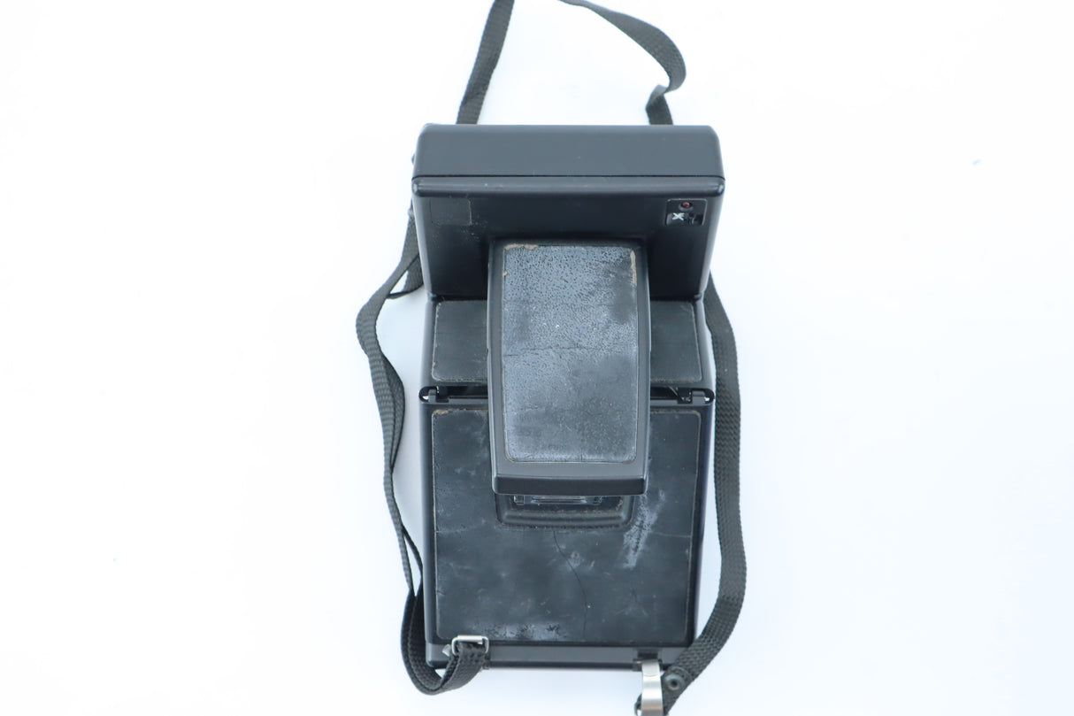 Polaroid SLR 680 – Folding Instant Camera with Sonar Autofocus.