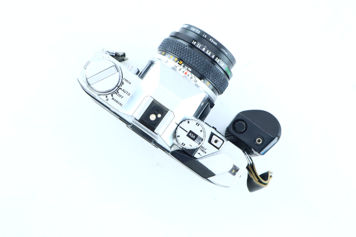 Olympus OM-30 | Zuiko 50mm f/1.8 & Winder 2