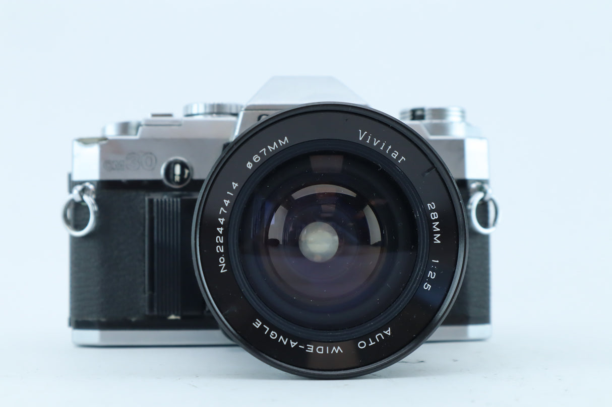 Olympus OM-30 + Vivitar 28mm f/2.5 – 35mm SLR