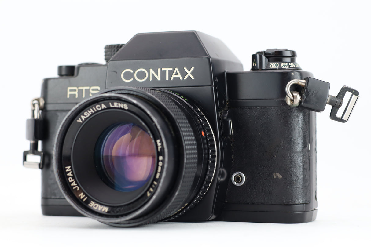 عدسة كونتاكس آر تي إس + 50 ملم 1.7 - عدسة مميزة مكتوب عليها