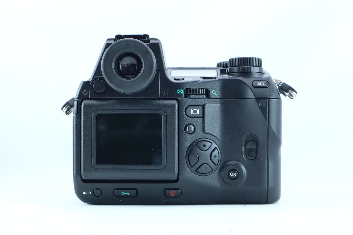 Olympus Camedia E-20P with 9-36mm f/2.0-2.4 ED Lens