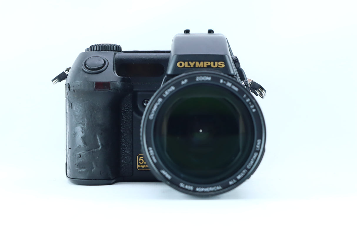 Olympus Camedia E-20P with 9-36mm f/2.0-2.4 ED Lens