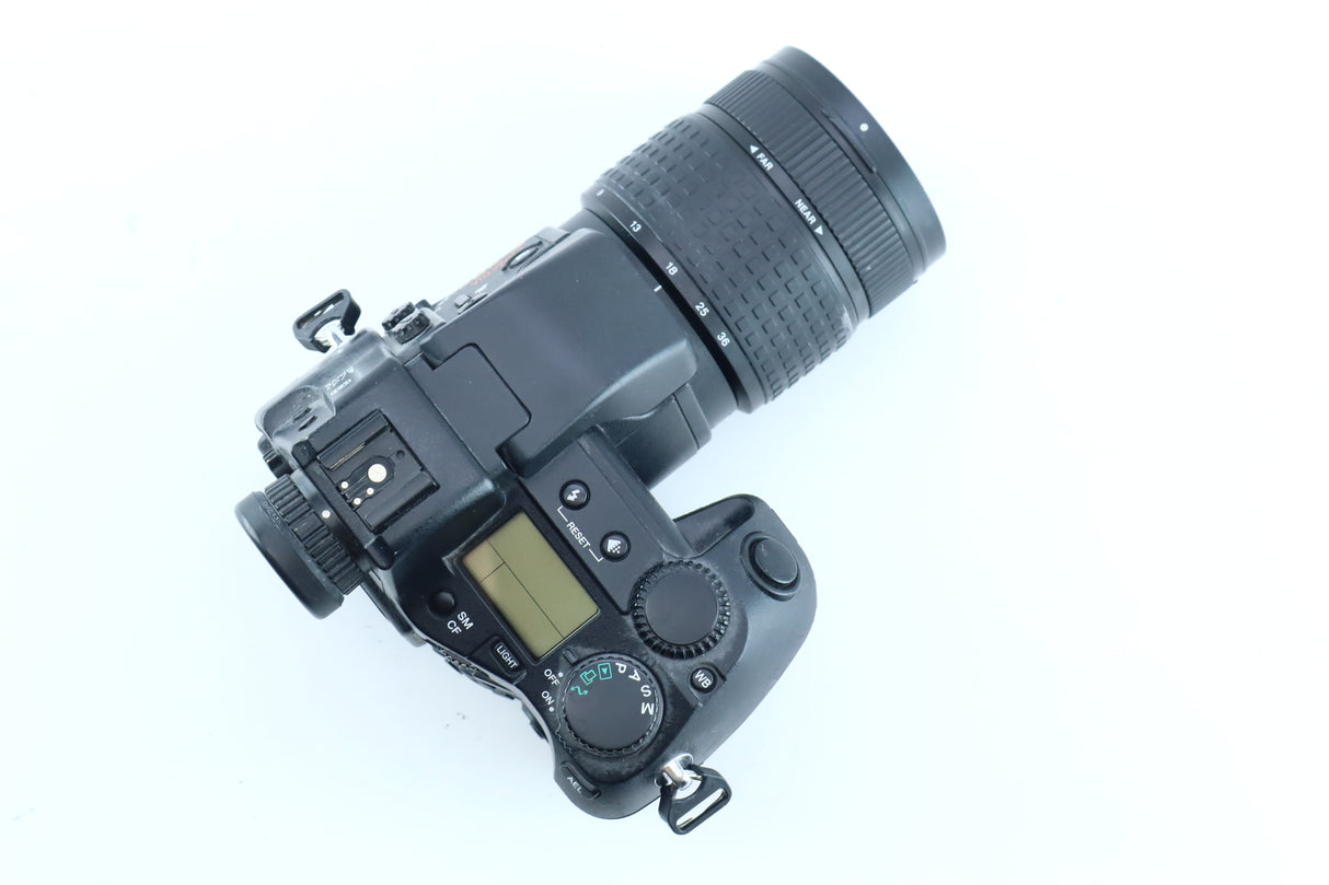 Olympus Camedia E-20P with 9-36mm f/2.0-2.4 ED Lens