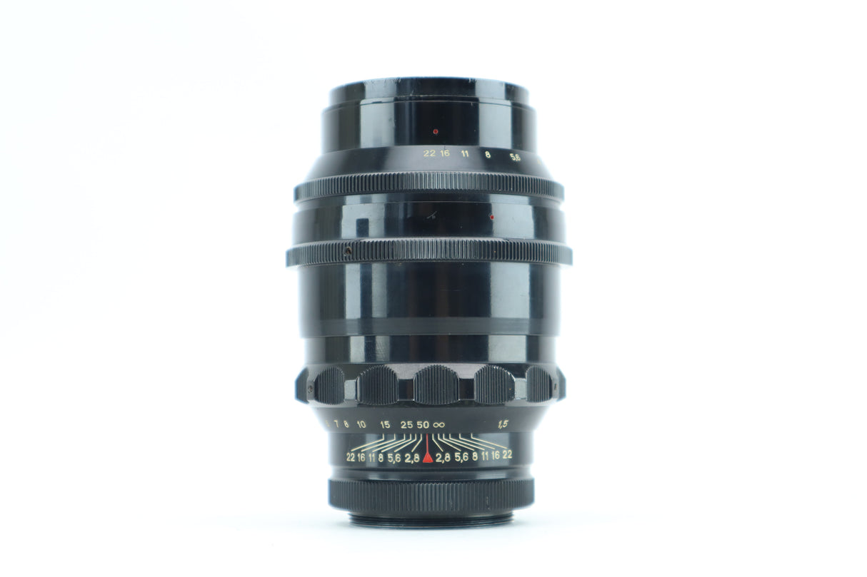 Tair-11-2 2,8/133 „kleine Flecken in der Linse“