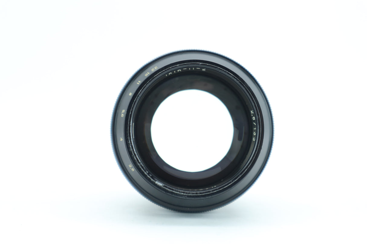 Tair-11-2 2,8/133 „kleine Flecken in der Linse“