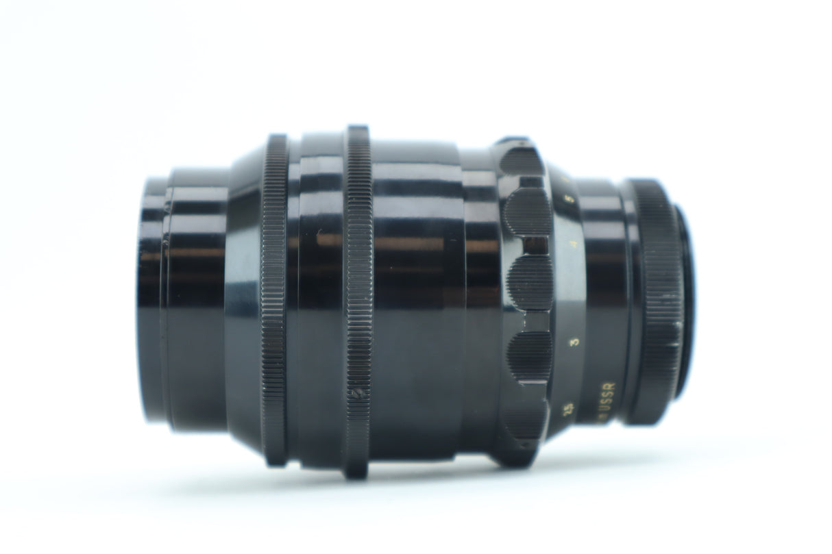 Tair-11-2 2,8/133 „kleine Flecken in der Linse“