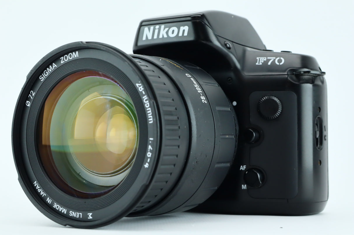 نيكون F70 + تكبير سيجما 28-105 ملم 2,8-4