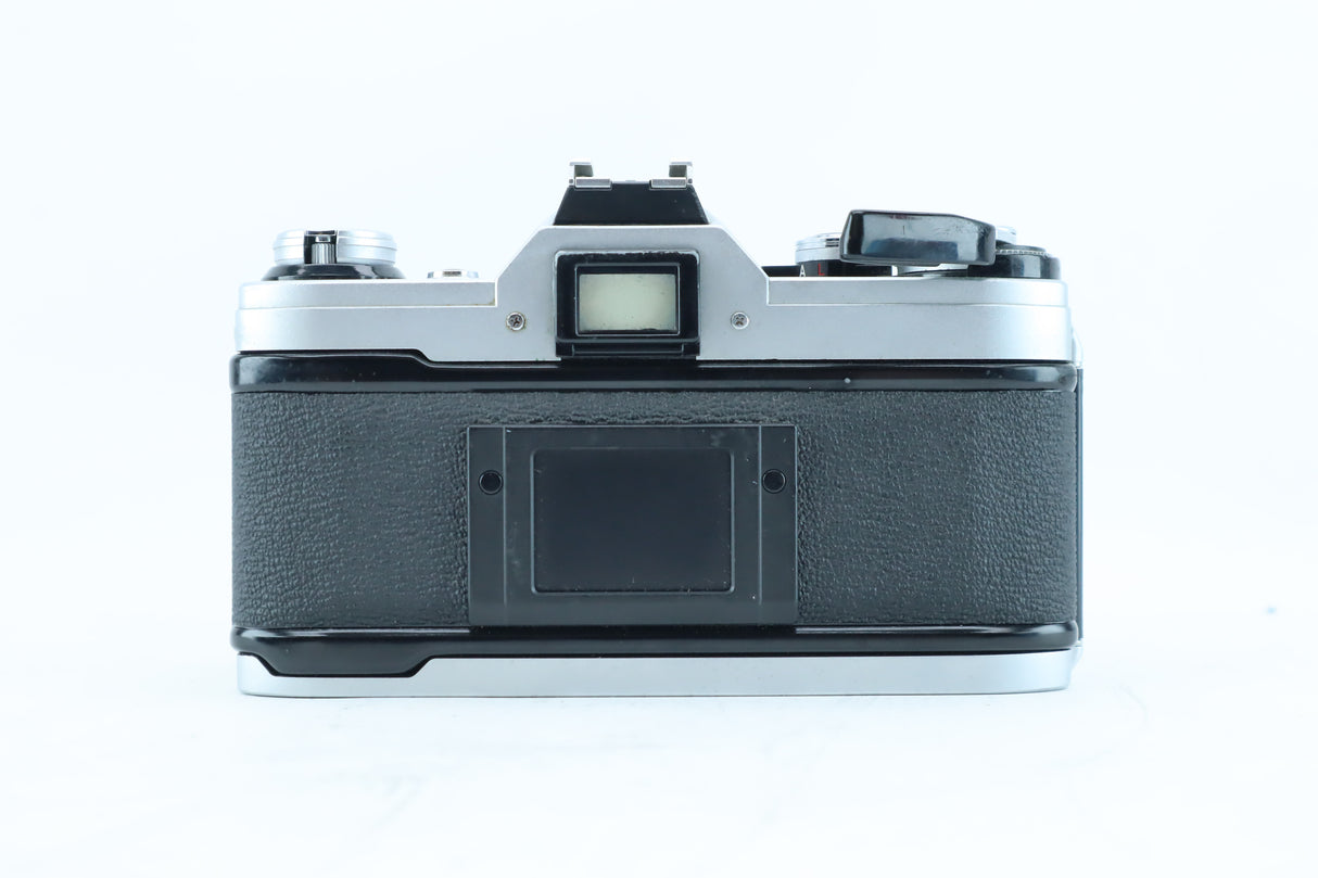 Canon AE-1 + RMC Tokina 35–70mm f/4