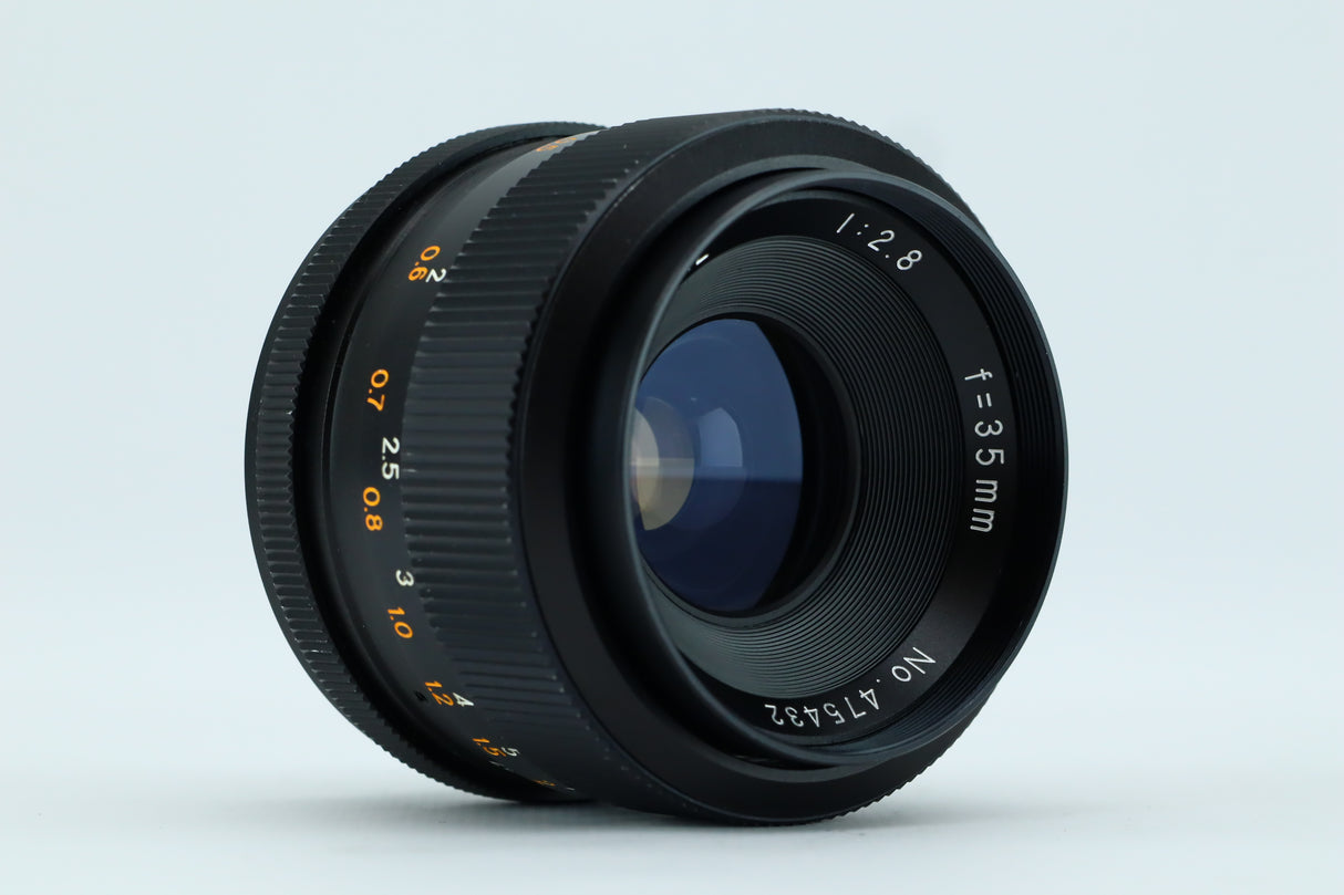 Revuenon-Spezialobjektiv 1:2,8 f=35 mm