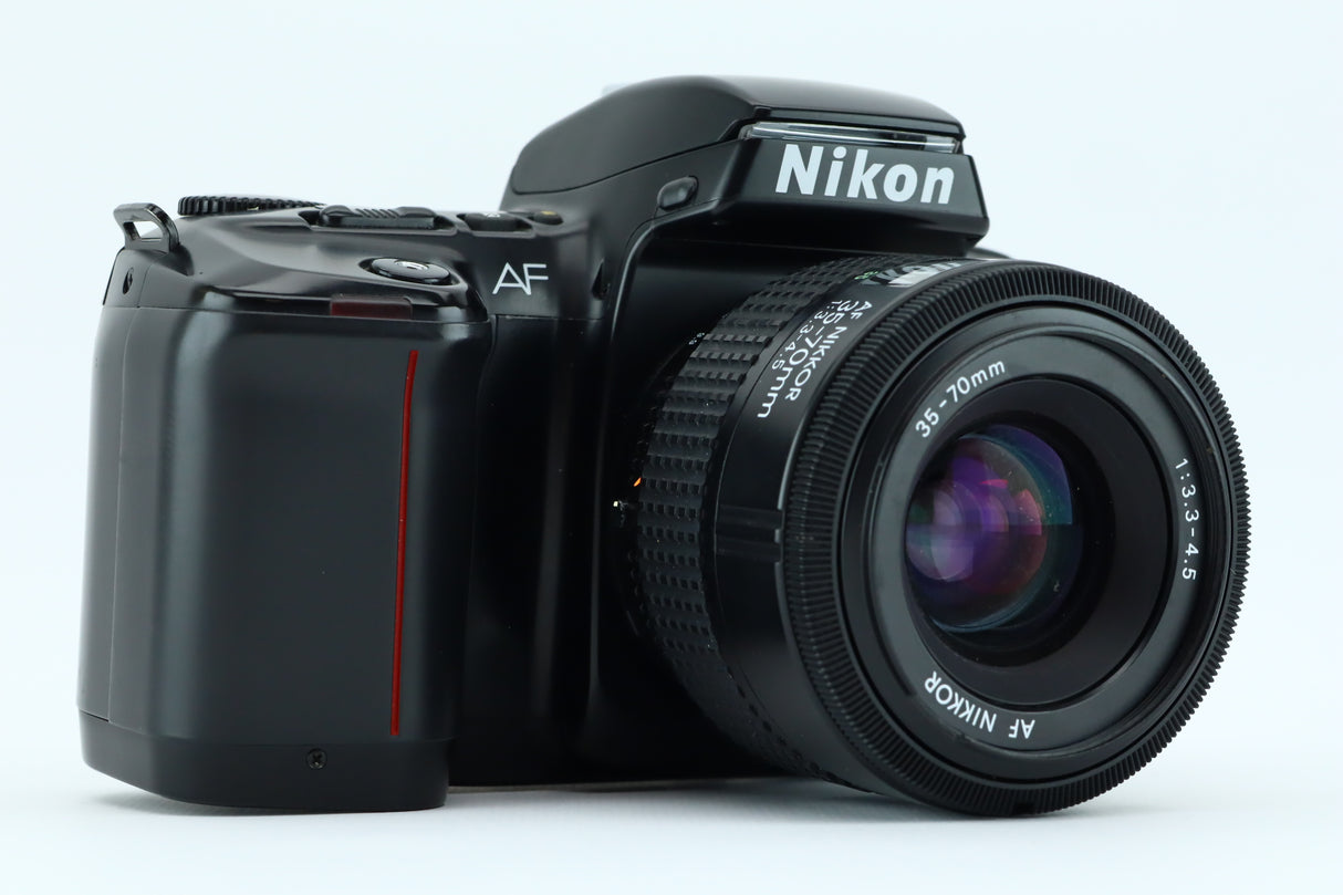 Nikon F-601 + 3,3-4,5 35-70mm
