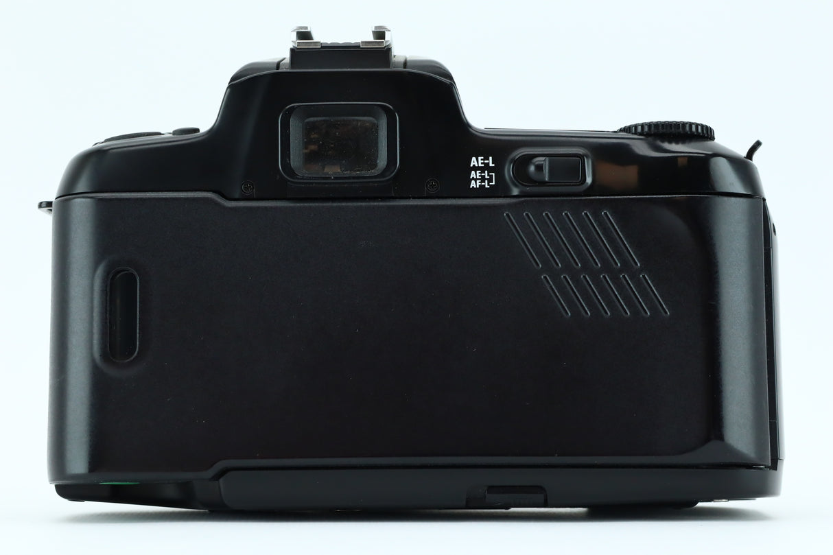 Nikon F-601 + 3,3-4,5 35-70mm