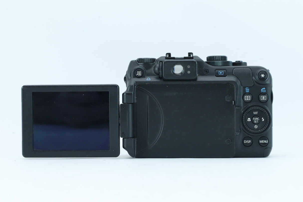 Canon PowerShot G12 (28-140mm f/2.8-4.5) | S/N: 293053018968