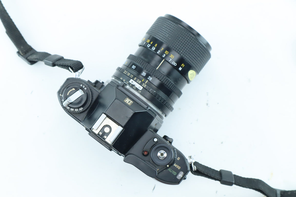 Nikon EM | S/N: 6688641 with Exact 28-70mm f/3.5-4.8 MC Macro