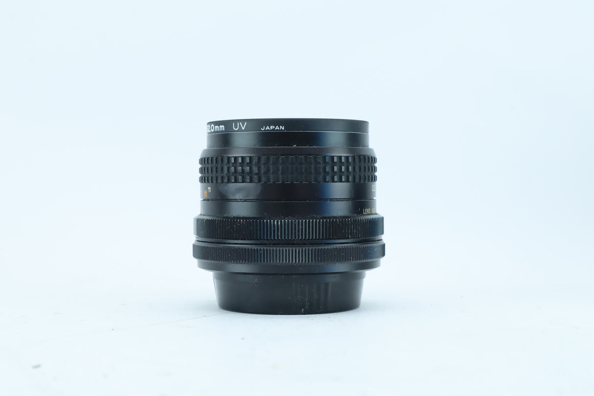 RMC Tokina 28mm f/2.8 with Wide-Angle Hood | S/N: 7704163