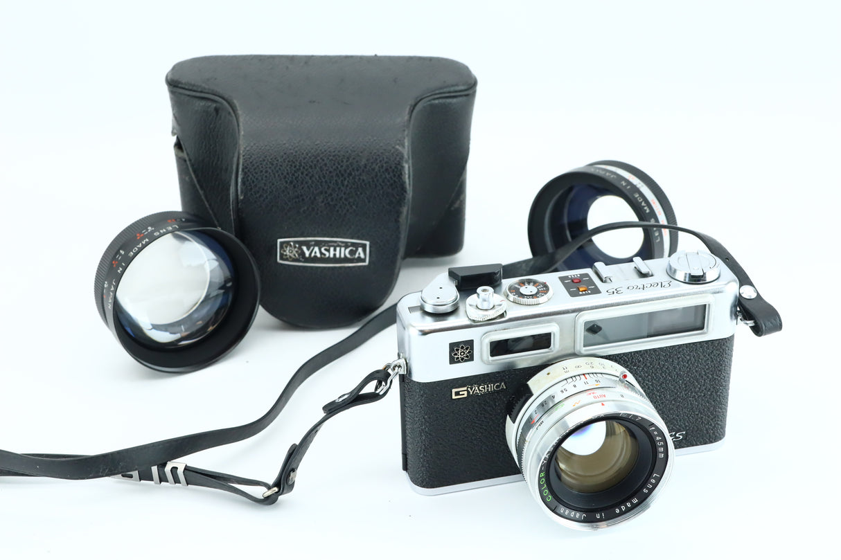 Yashica Electro 35 GS + Yashinon 45mm f/1.7 + obiettivo grandangolare Yashikor 1:4 + teleobiettivo Yashikor 1:4