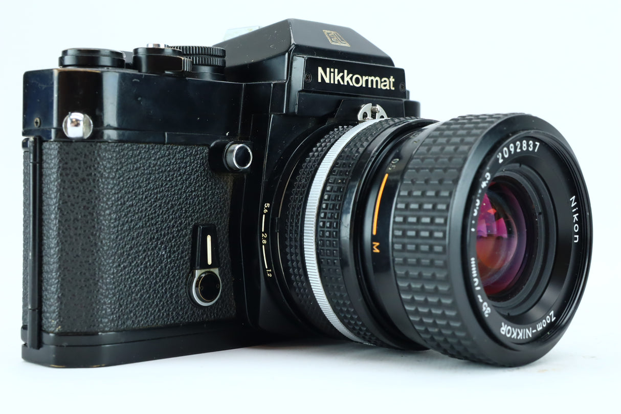 Nikkormat (SN: w7516249) + Nikon Zoom 35–70mm f/3.3–4.5 (SN: 2092837) – Solid Mechanical SLR with Versatile Zoom Lens