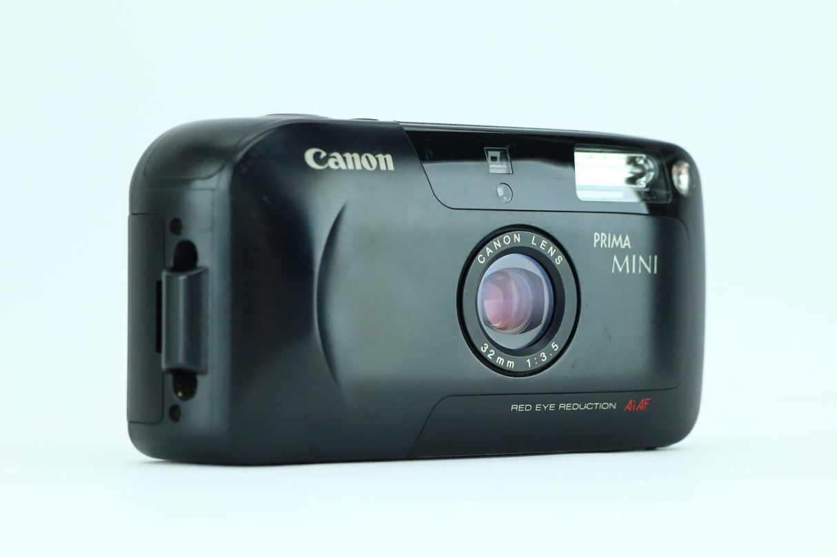 كانون بريما ميني مع عدسة كانون 32 ملم 1:3.5