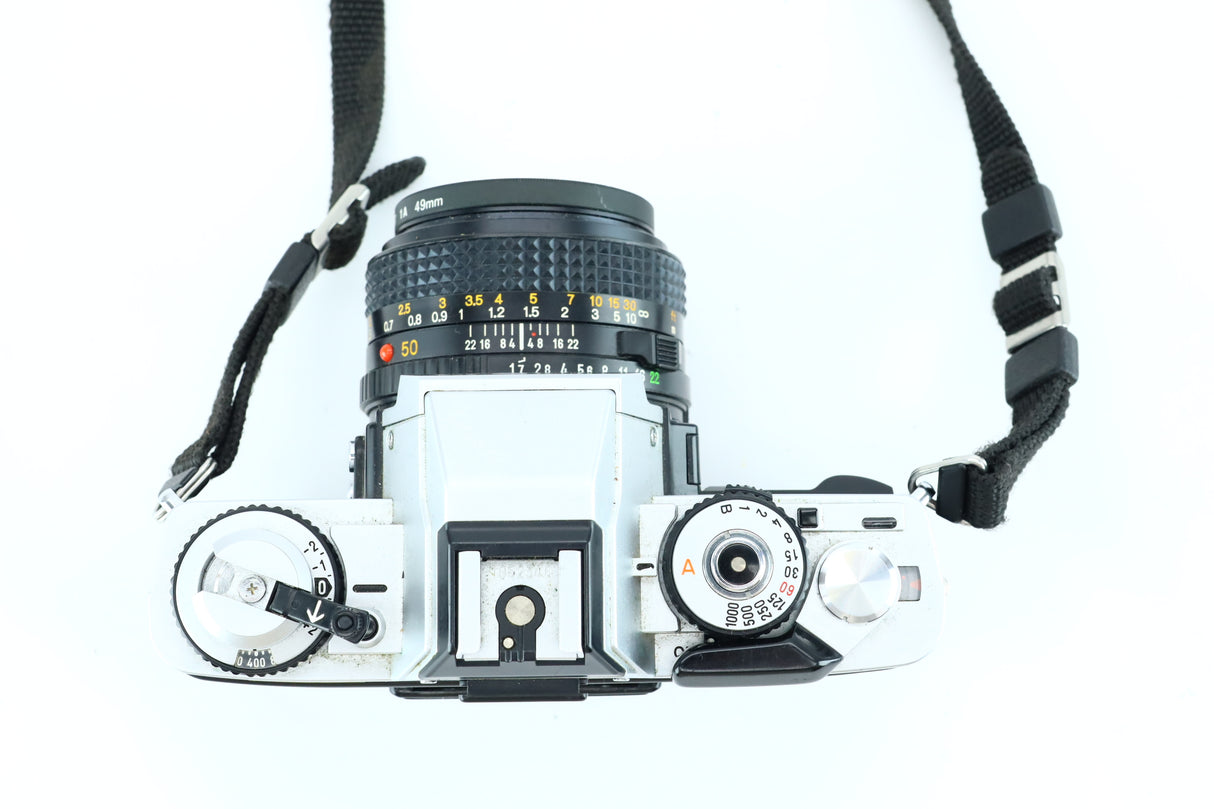 Minolta XG-M + Minolta MD 50mm f/1.7 (SN: 8390490)