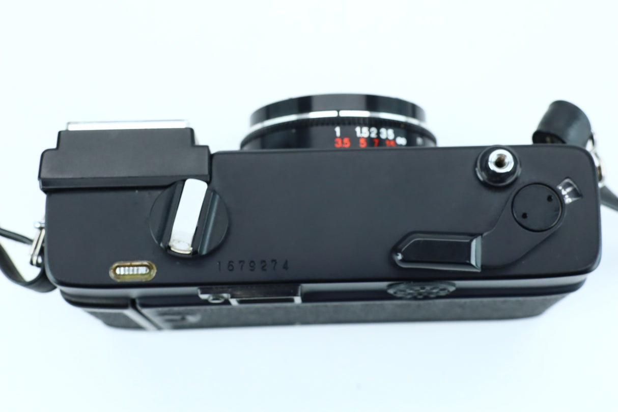 Konica C35 EF + Hexanon 38mm f/2.8 (SN: 1679274)