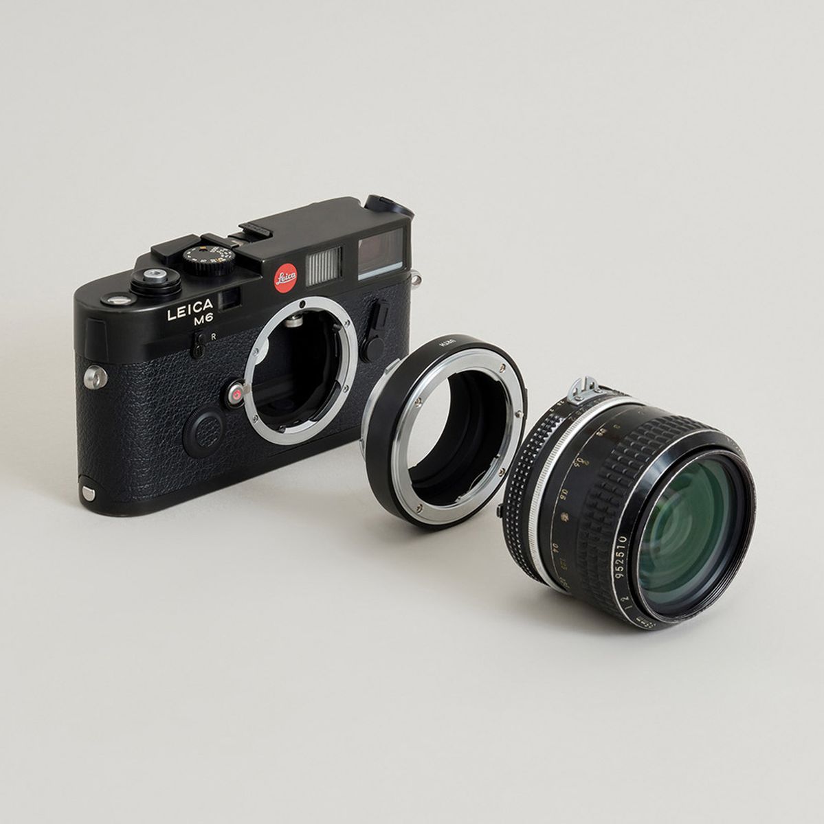 Urth Lens Mount Adapter: Compatible w/ Nikon F Lens To Leica