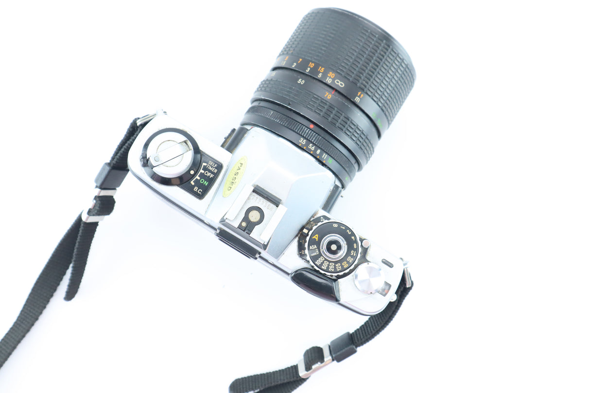 Minolta XG-1 + Makinon MC 35–70mm f/3.5–4.5