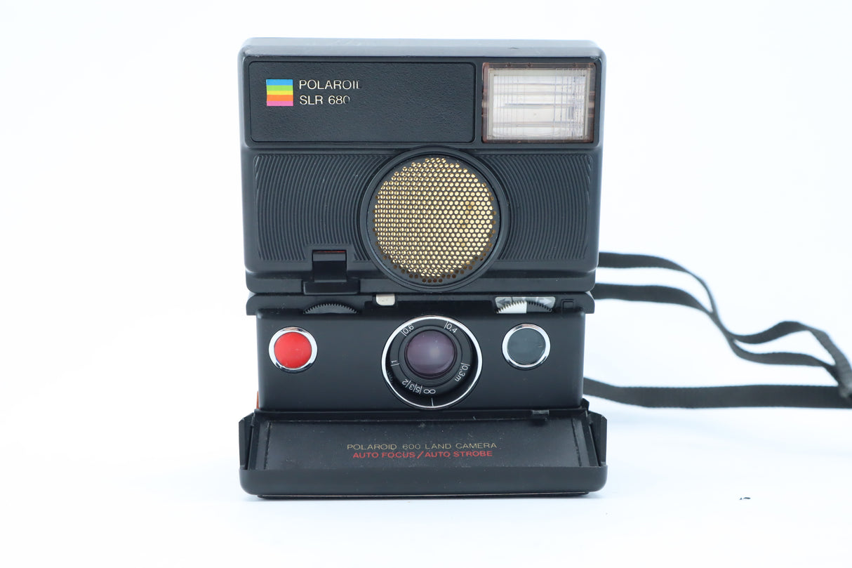 Polaroid SLR 680 – Folding Instant Camera with Sonar Autofocus.