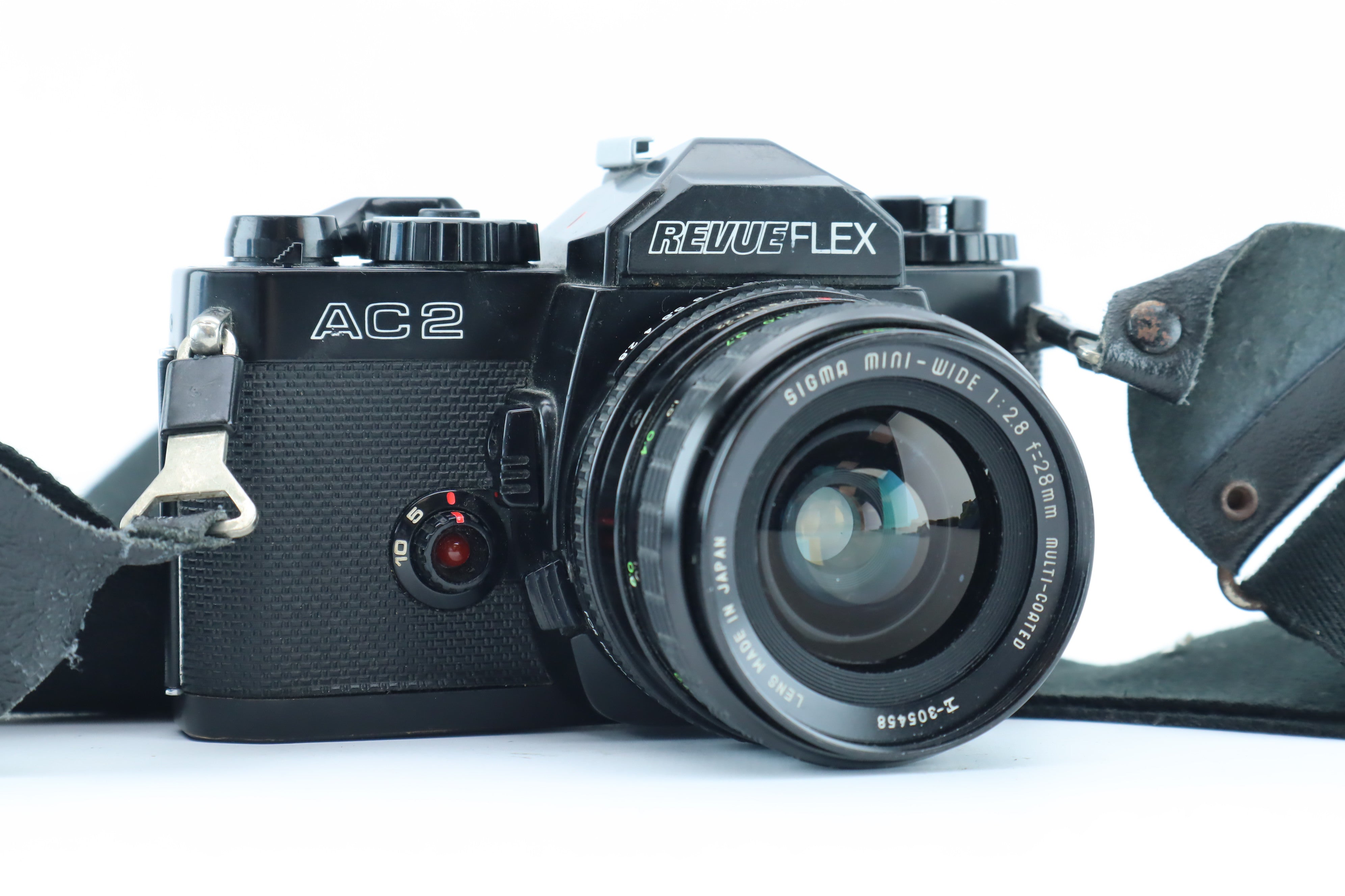 Revueflex AC2 – sigma mini0wide 1:2.8 28mm multi coated – Hard to