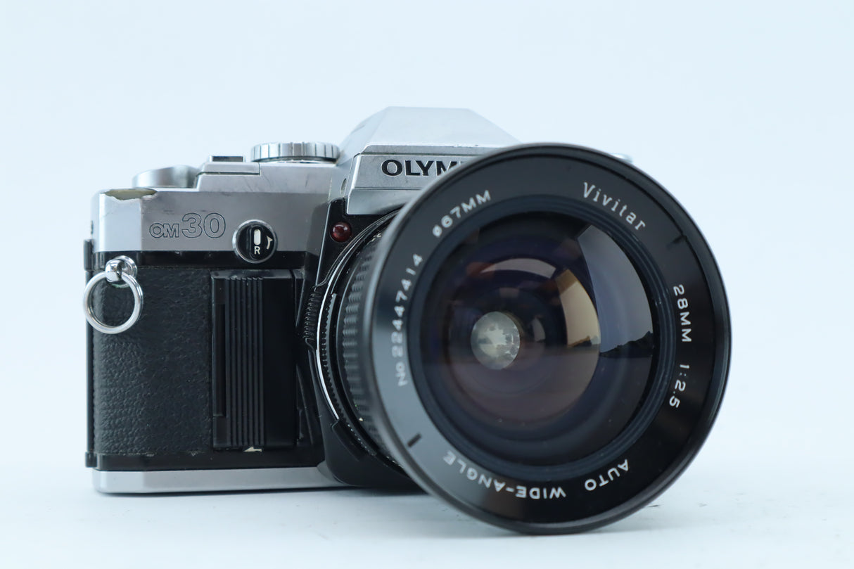 Olympus OM-30 + Vivitar 28mm f/2.5 – 35mm SLR