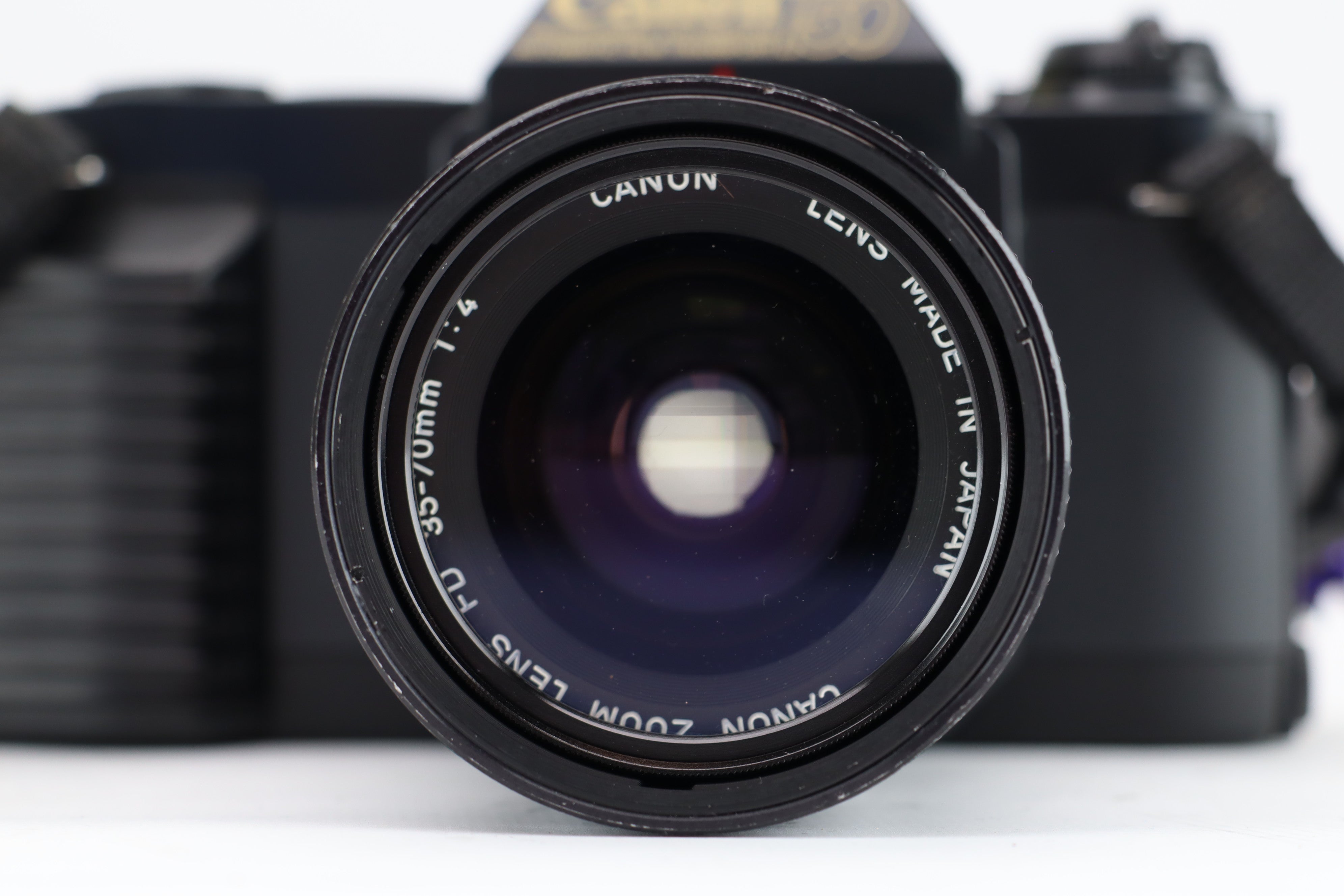 Canon T50 + FD 35-70mm 4 – Hard to Find Camera Store