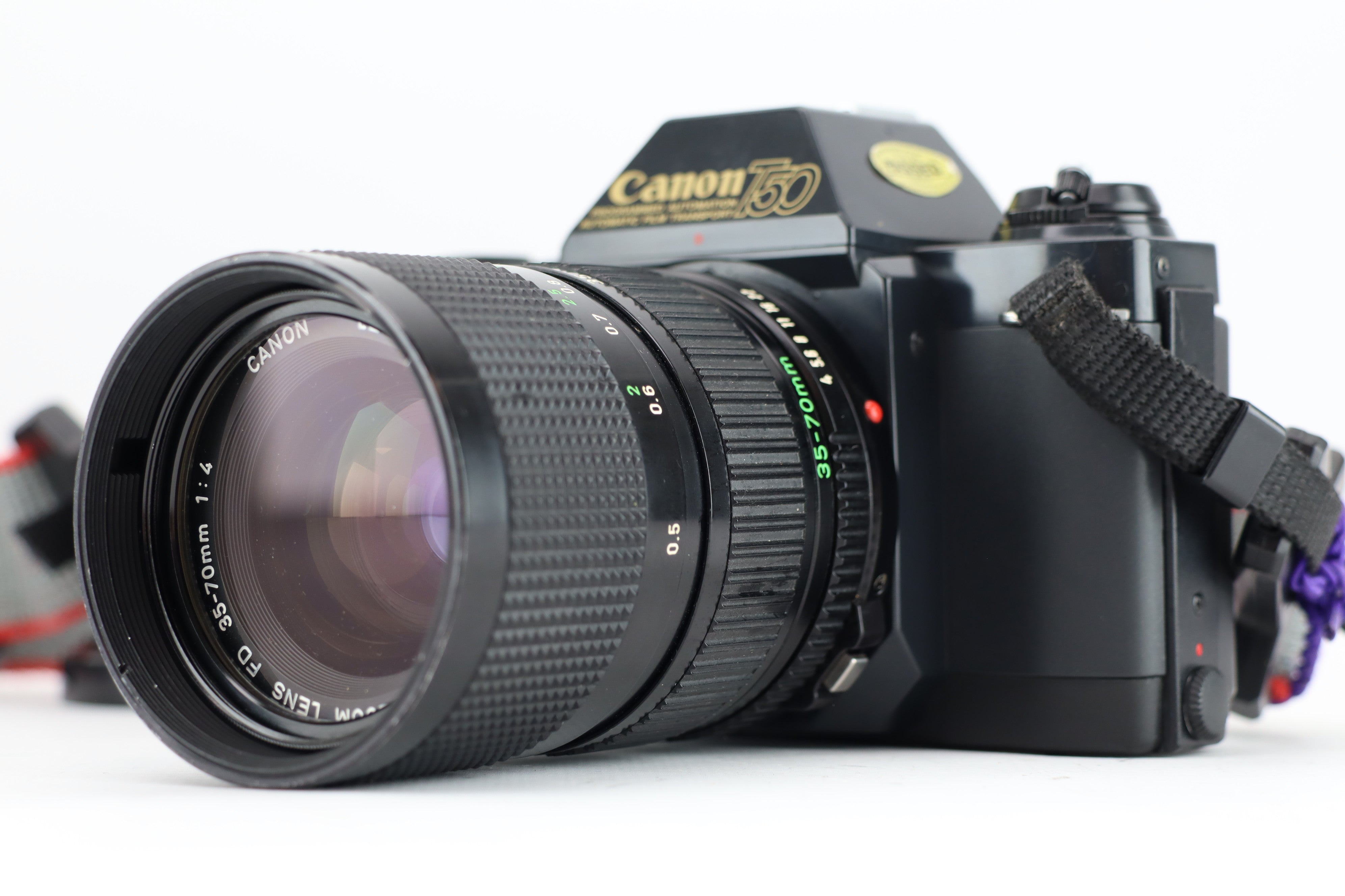Canon T50 + FD 35-70mm 4 – Hard to Find Camera Store