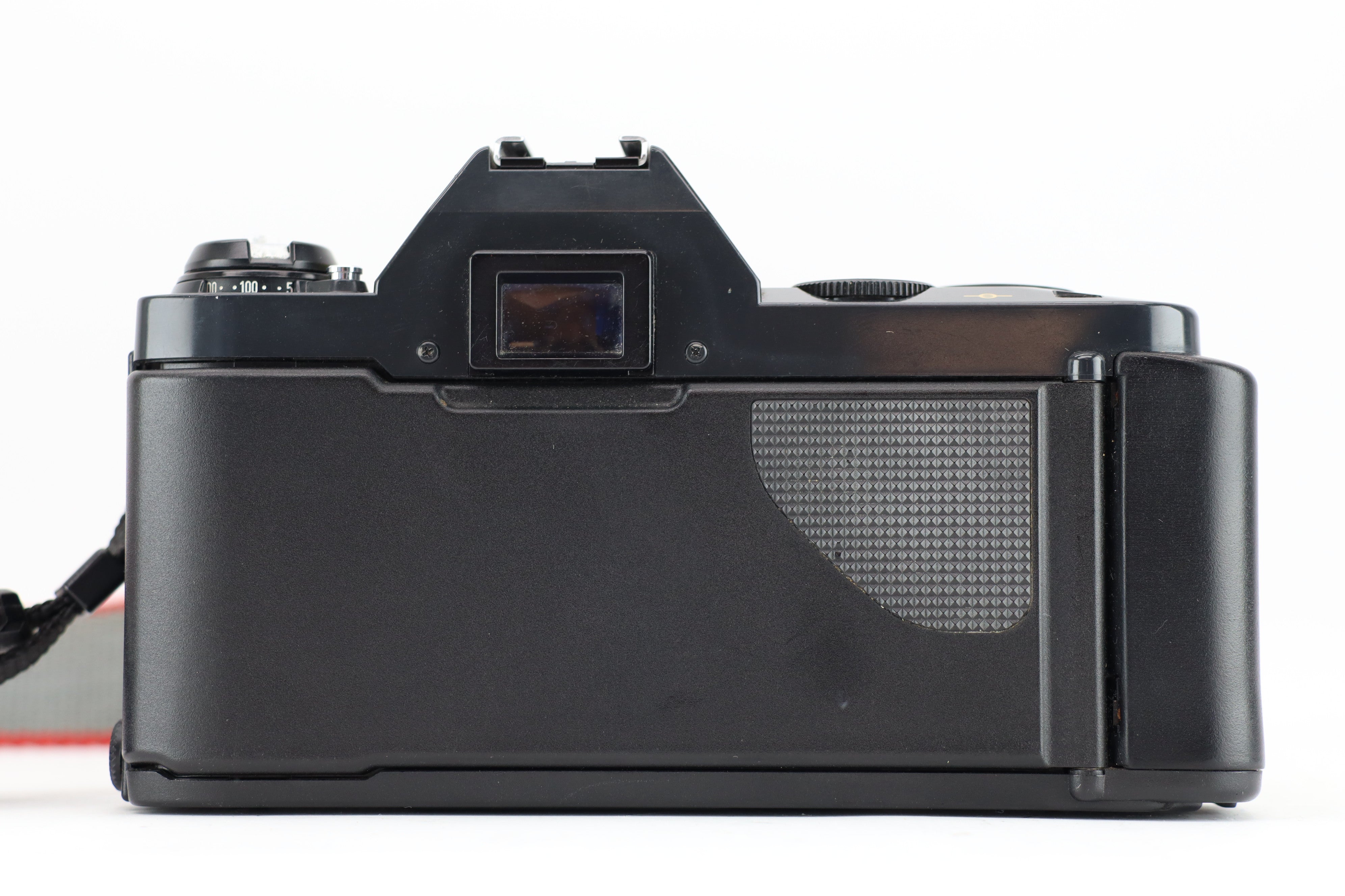 Canon T50 + FD 35-70mm 4 – Hard to Find Camera Store