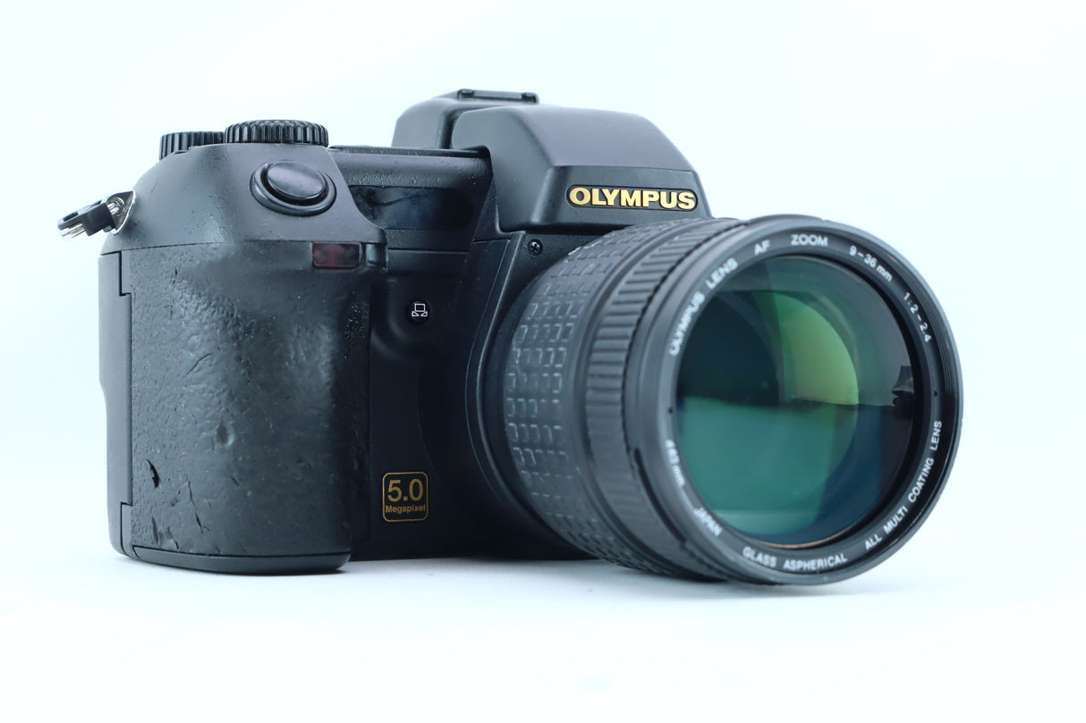 Olympus Camedia E-20P with 9-36mm f/2.0-2.4 ED Lens