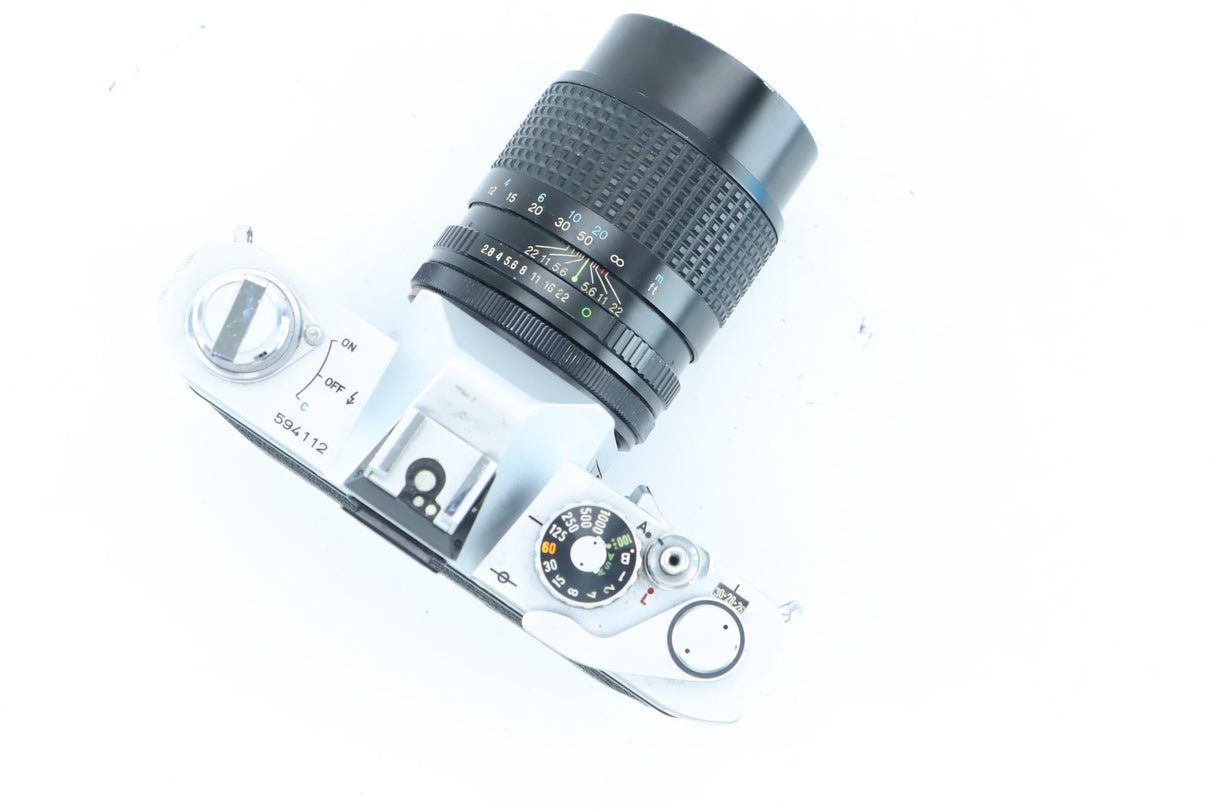 Canon FTb QL + Tokina RMC 135mm f/2.8