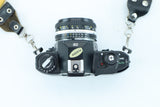 Nikon EM with Nikon Lens Series E 50mm f/1.8