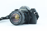 Nikon EM | S/N: 6688641 with Exact 28-70mm f/3.5-4.8 MC Macro