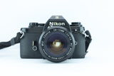 Nikon EM | S/N: 6688641 with Exact 28-70mm f/3.5-4.8 MC Macro