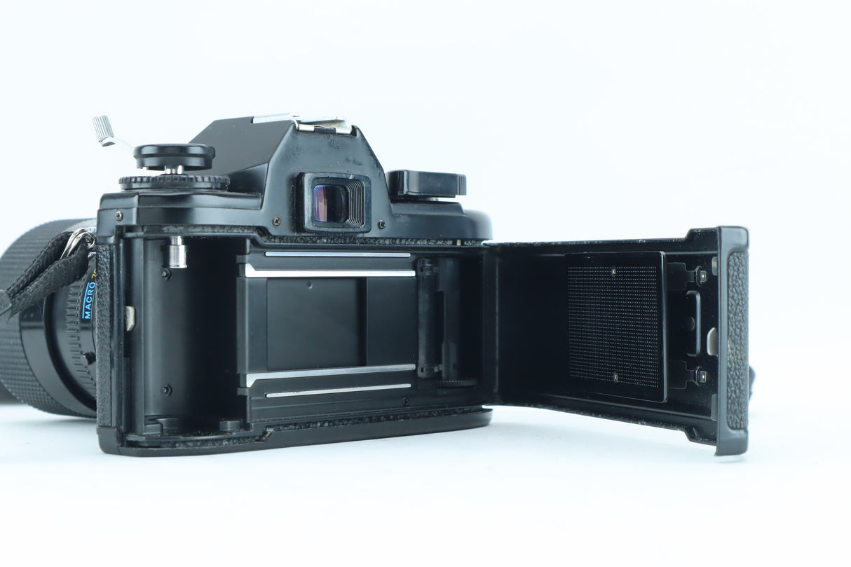 Nikon EM | S/N: 6688641 with Exact 28-70mm f/3.5-4.8 MC Macro