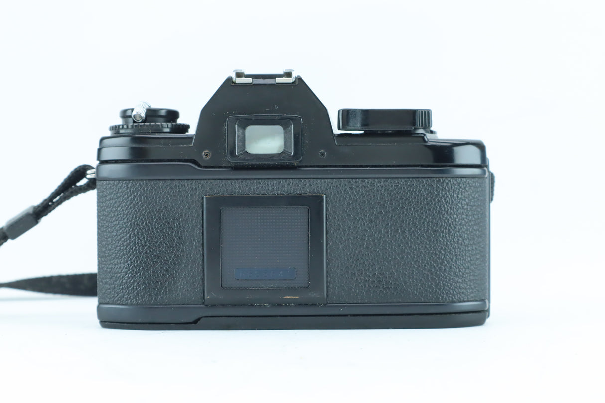 Nikon EM | S/N: 6688641 with Exact 28-70mm f/3.5-4.8 MC Macro