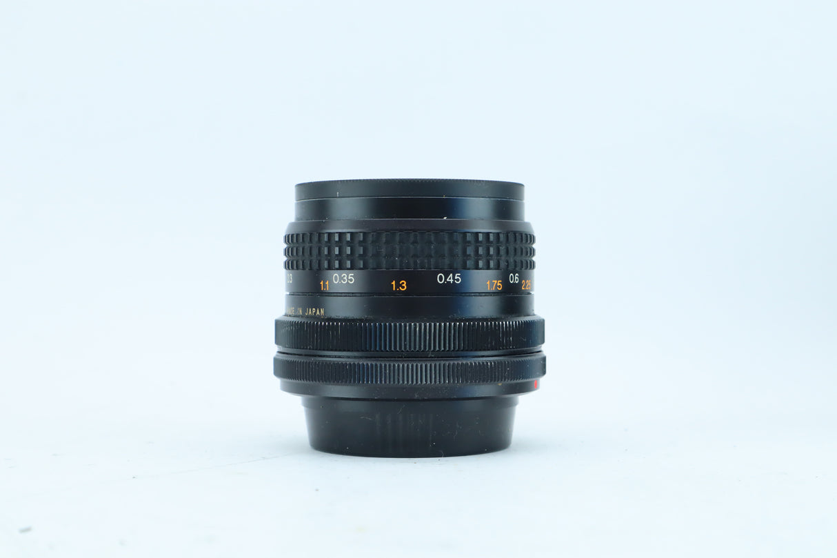 RMC Tokina 28mm f/2.8 with Wide-Angle Hood | S/N: 7704163