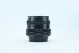 RMC Tokina 28mm f/2.8 with Wide-Angle Hood | S/N: 7704163
