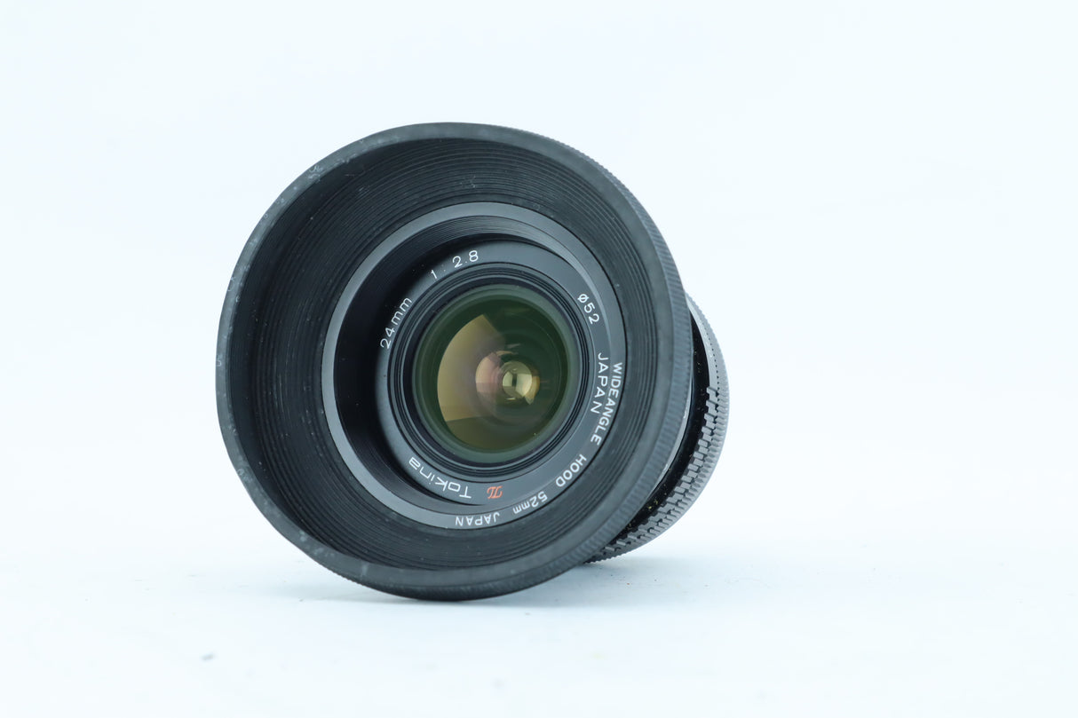 Tokina 24mm f/2.8 with Wide-Angle Hood | S/N: 7105670