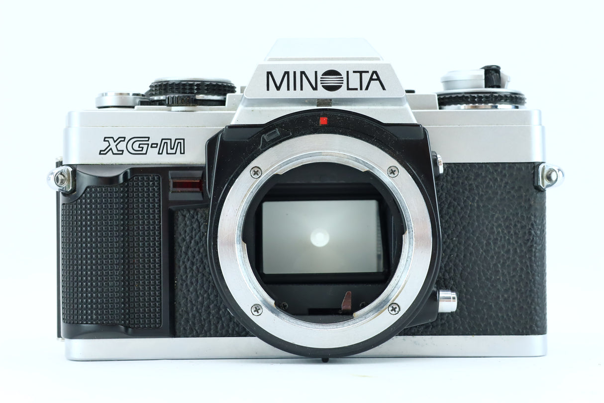 Minolta XG-M Set – 28mm, 50mm, 75–150mm + Grip + Teleconverter
