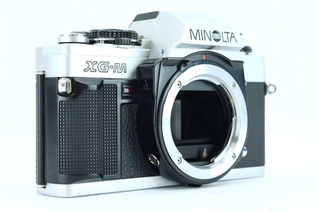 Minolta XG-M Set – 28mm, 50mm, 75–150mm + Grip + Teleconverter