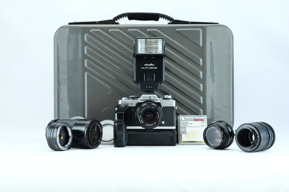 Minolta XG-M Set – 28mm, 50mm, 75–150mm + Grip + Teleconverter