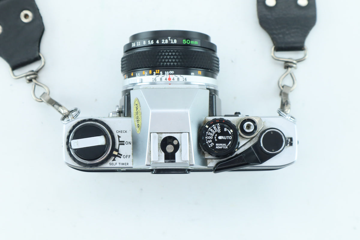 Olympus OM-10 35mm SLR Kit with Zuiko MC Auto-S 50mm f/1.8 - Good Condition